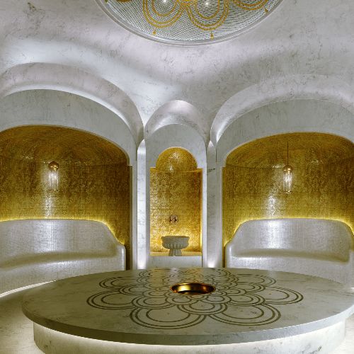 Hammam with marble vaults and gold mosaic alcoves